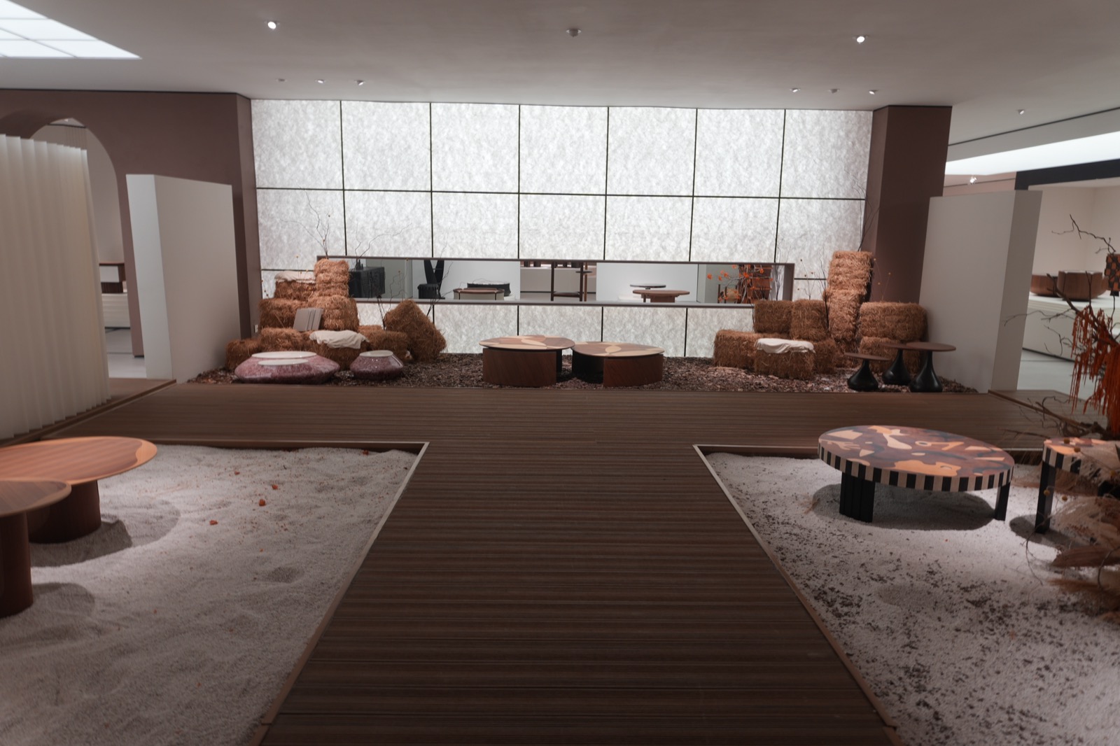 Textured lounge seating and sculptural coffee tables